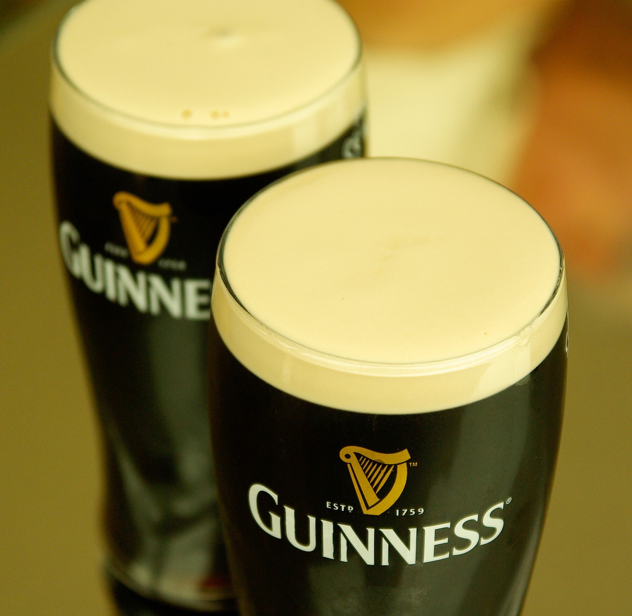 A beer poured in Guiness glass