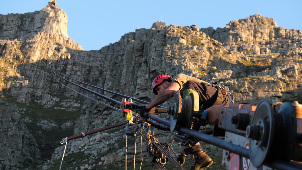 A mechanic fixing the cables at table mountain cableway