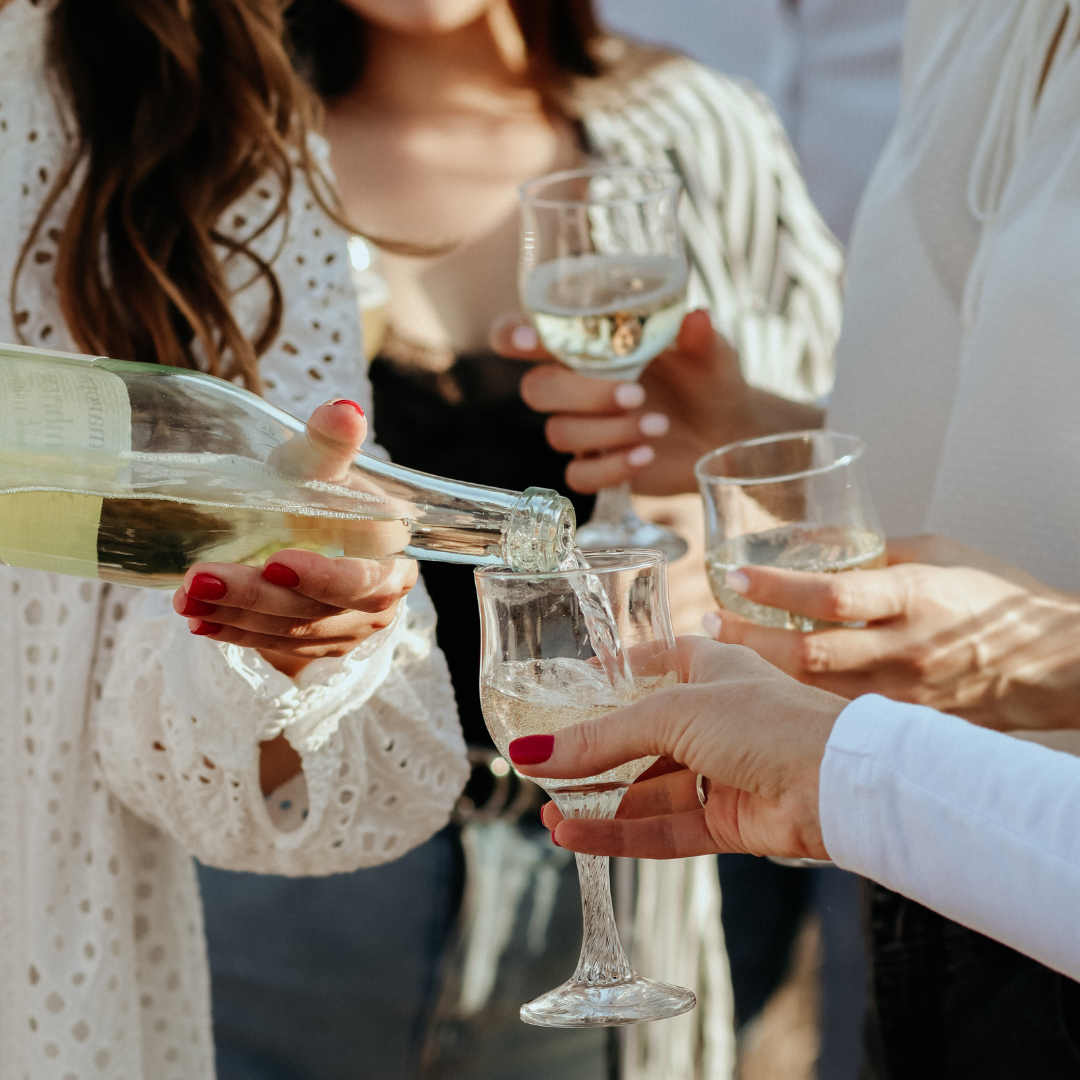 Friends enjoying a glass of wine
